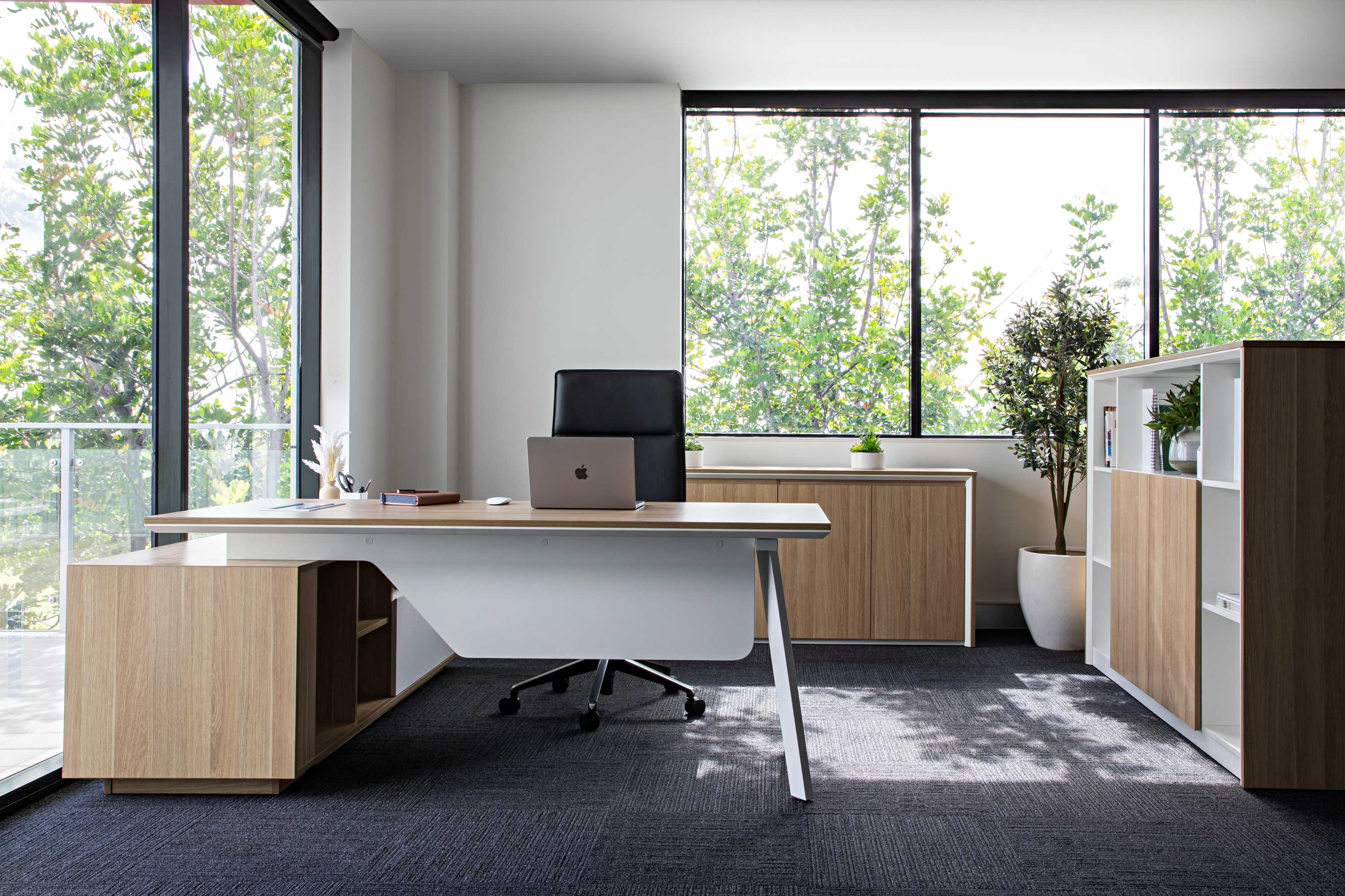 Commercial office with executive desks and seating for workplace fitouts